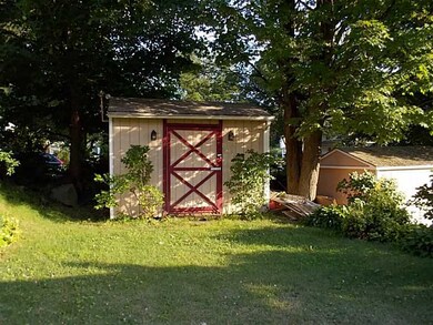 Exterior Back. 2 sheds....