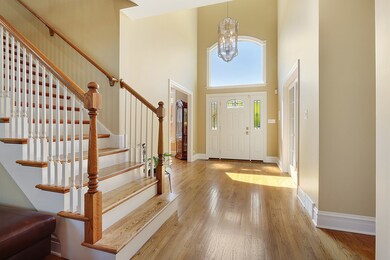 Grand foyer leads to study and dining room