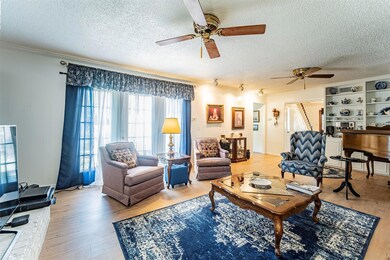 Another view of the gracious formal living room.