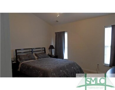 Master Bedroom. SPACIOUS MASTER FEATURES FAUX WOOD
