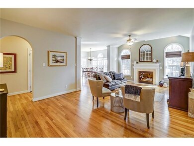 Family room arched opening leads to rear hallway, 