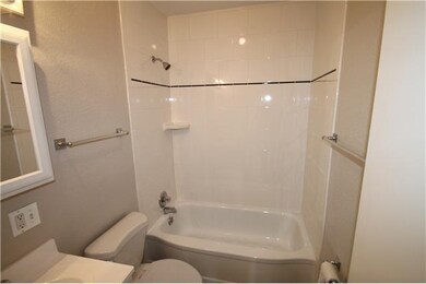 Master Bath/Spa. Bathroom with new tile surround o