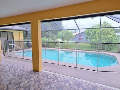 Private pool and large covered patio area for lounging.