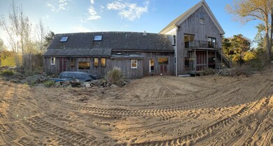 Real of house showing back yard