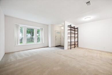 View of the living room and dining area.