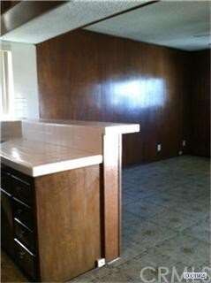 LOOKING FROM KITCHEN TO FAMILY ROOM