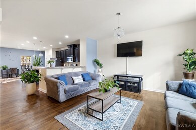Living room featuring dark hardwood / wood-style f