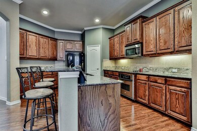 Kitchen with granite counter tops, walk-in pantry 