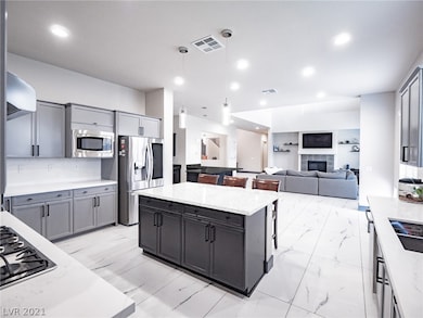 Kitchen island is being replaced with white quartz