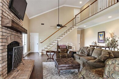 Spacious Living Room with Soaring Ceilings & Wood-