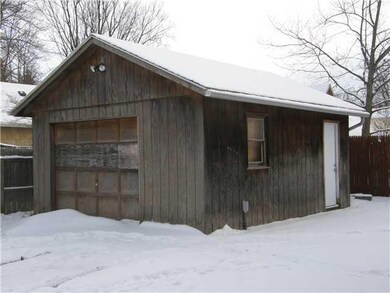 Parking Lot/Garage. 1 1/2 car garage built in 1987