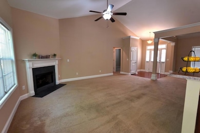 Unfurnished living room featuring a fireplace with