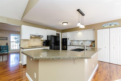 This center island with overhang will accommodate 