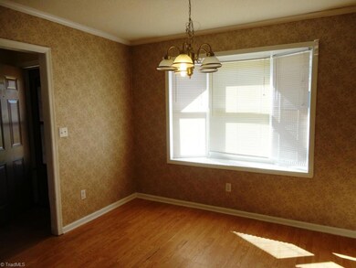 Breakfast Area in the Kitchen with a large Bay window.