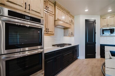 Kitchen featuring light hardwood / wood-style floo