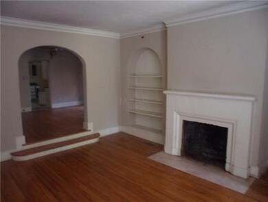 Unit 267 Living Room with fireplace, built-in book