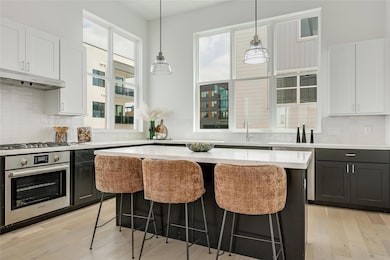 The gourmet island kitchen is a true showpiece with desirable modern finishes that are sure to impress. 