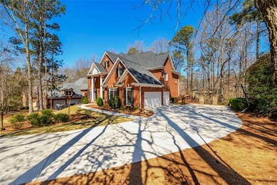 View of the Driveway and side of the home with 3 C