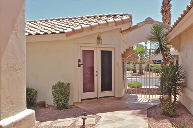 Gated front courtyard area
