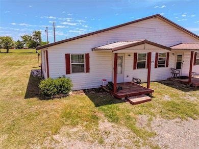 View of front of property featuring a front yard
