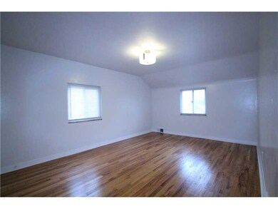 Master Bedroom. Attractive wood floors and lightin