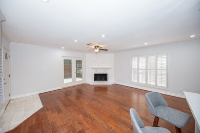 Large living room with fireplace, wet bar