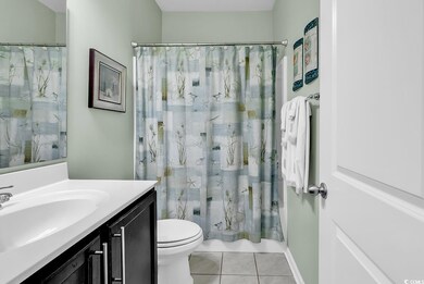 Full bathroom with shower / bathtub combination wi