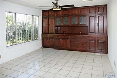 Spacious Living Room with Tile Flooring, Ceiling F