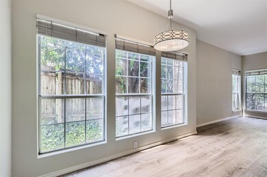 Unfurnished dining area featuring wood finished f