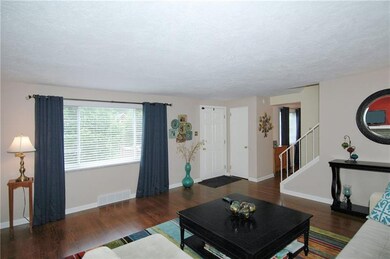 Living Room - Coat closet, stairs to second floor,