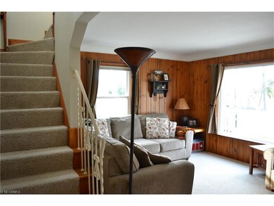 Living room is light and bright with large picture