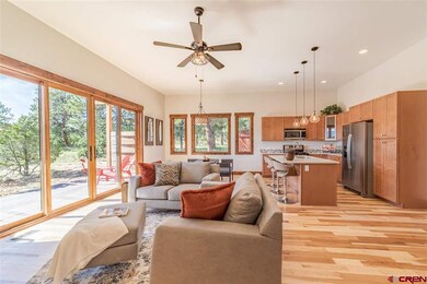 Great room open concept with kitchen and office no