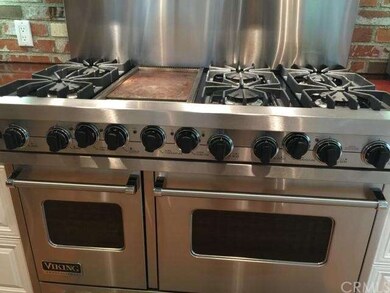Professional Viking 6 burner range with griddle to