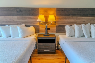 Bedroom featuring wood finished floors