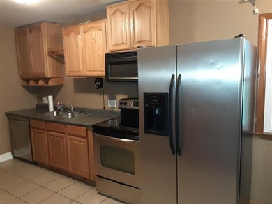 Kitchen view with Stainless Steel Refrigerator