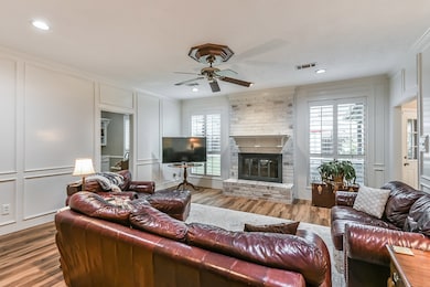 Living room features plantation shutters with 3 inch blades, updated recessed lighting! Double pane insulated windows throughout the home!