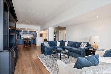 Large living room is open to the kitchen