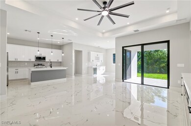 Kitchen with visible vents, appliances with stainl