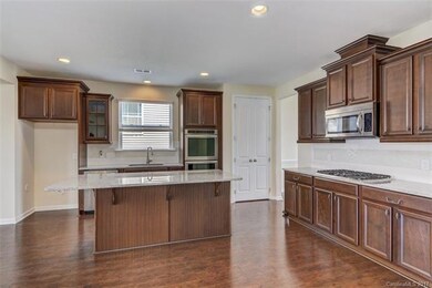 Beautiful cabinets, granite counters, tile backspl