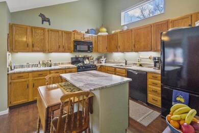 Another look back at kitchen - island with breakfast bar design