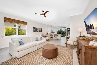 Living room with visible vents, ornamental molding