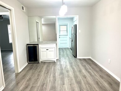 Dining area with wine fridge.