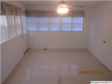 Den/sunroom has lots of windows. This room and the