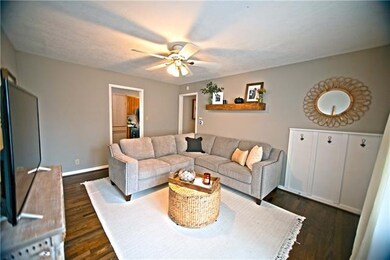 Front room with fresh paint and refinished hardwoo