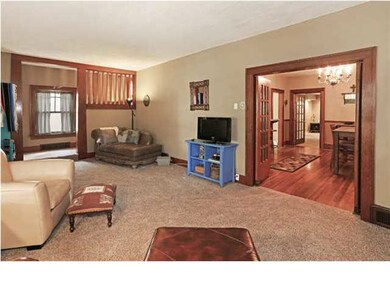 Double french doors lead to the dining room.