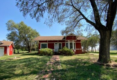 View of front facade featuring a garage and a fron