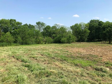 Creek gently winds along the side. 