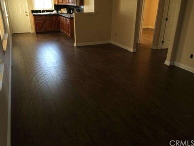 Dark Wood-Like Flooring throughout 