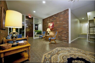  As soon as you enter the building's Lobby, you are gallantly welcomed by this distinguished vintage rustic interior!