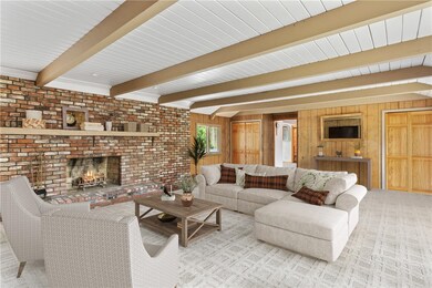 FAMILY ROOM W/ FP FURN VIRTUALLY STAGED
